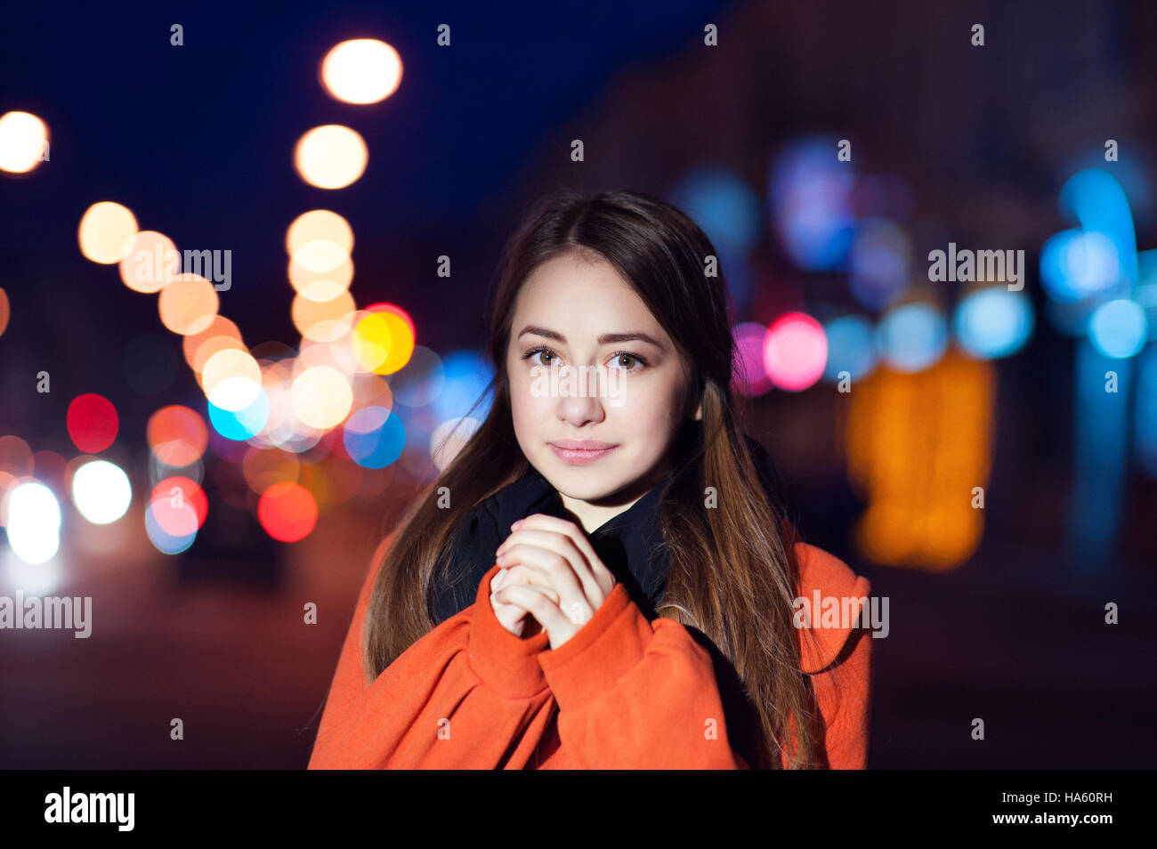 beautiful young woman walking in the night city Stock Photo - Alamy