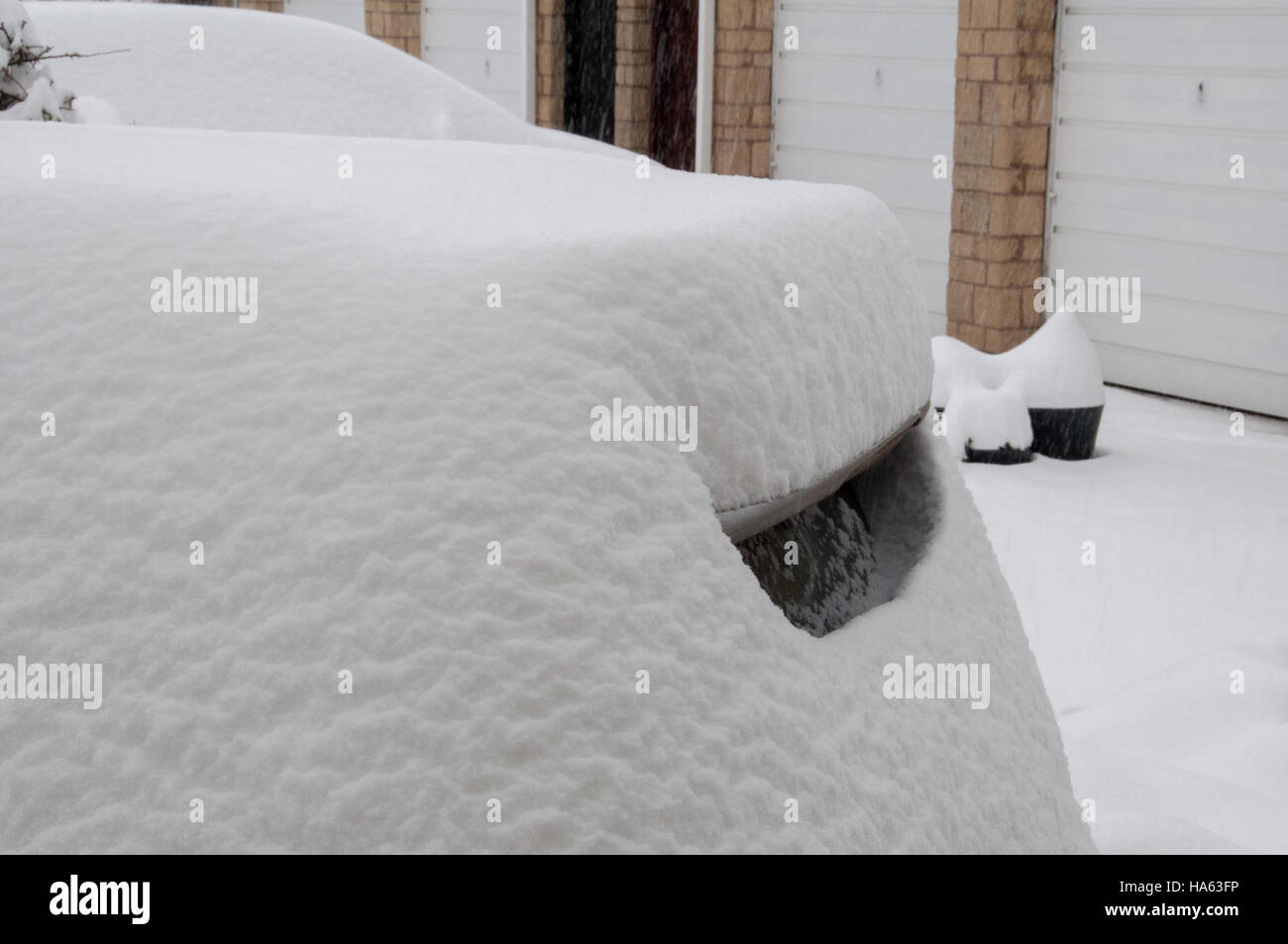 Rear spoiler on car covered with snow Stock Photo