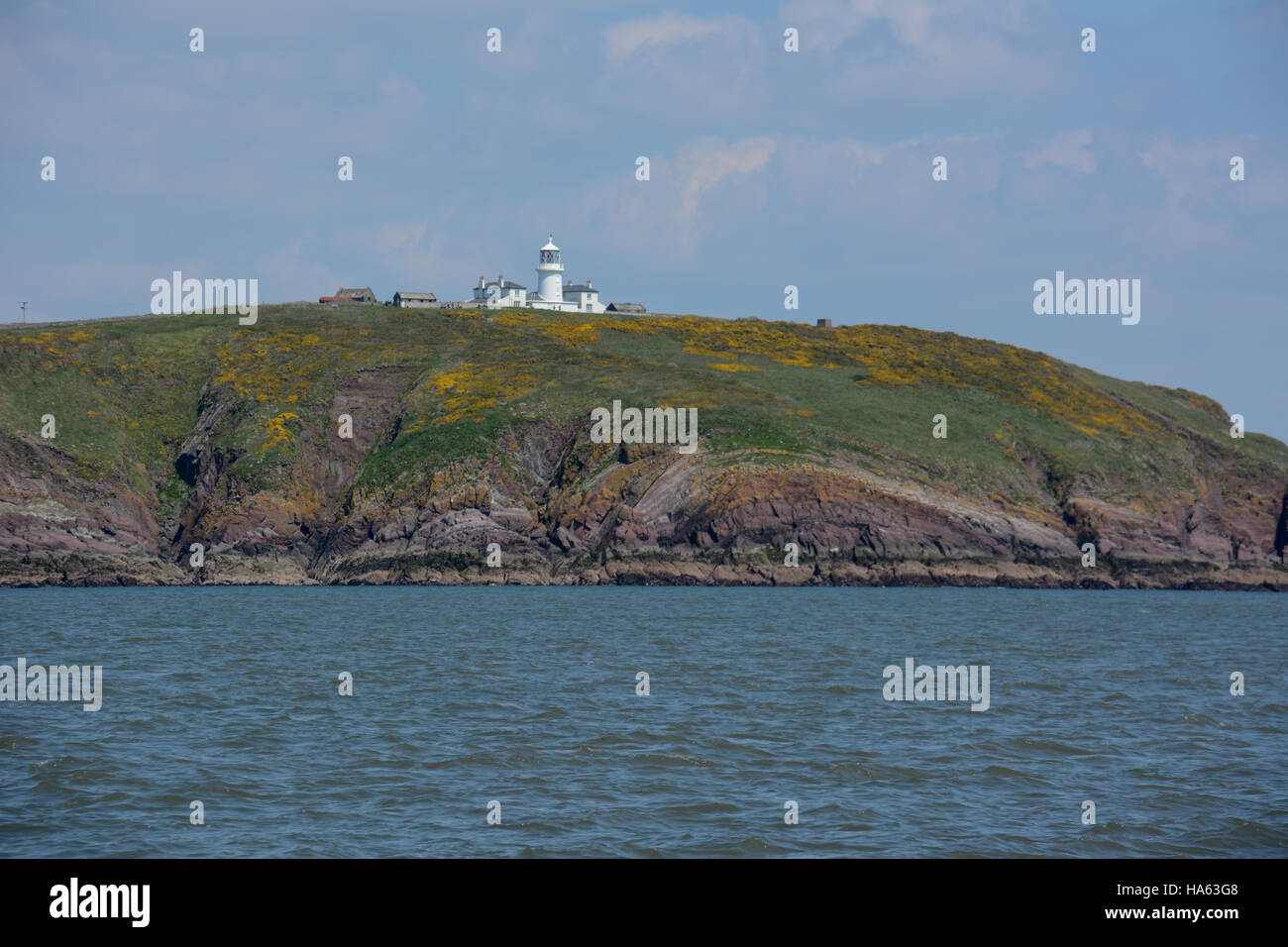 St Ann's Head Lighthouse on the cliffs at the north shore of the entrance to Milford Haven. Near Dale, Pembrokeshire Stock Photo