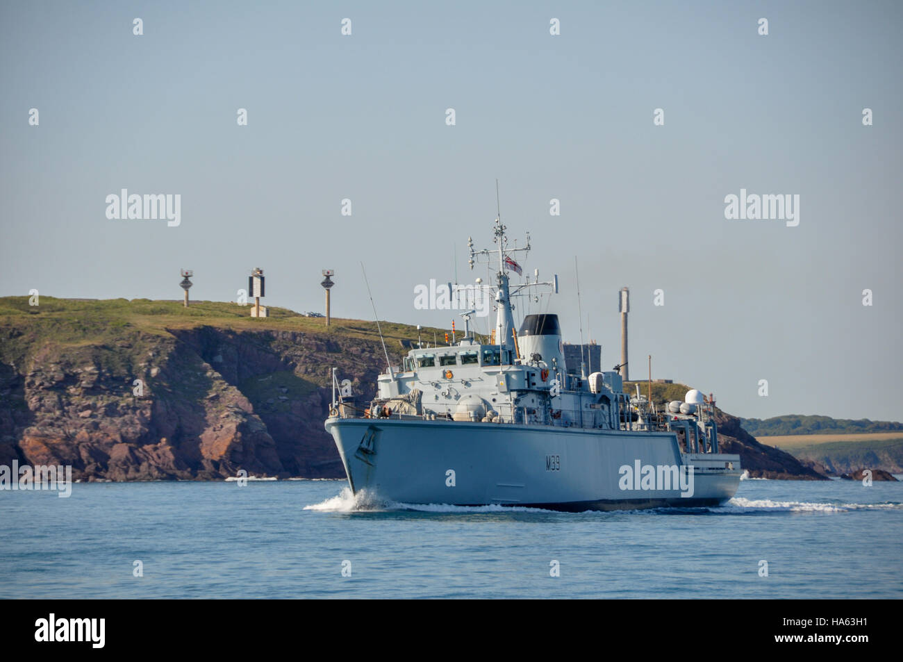 HMS Hurworth executing a high speed turn within Milford Haven, Pembrokeshire, on a calm summers day Stock Photo