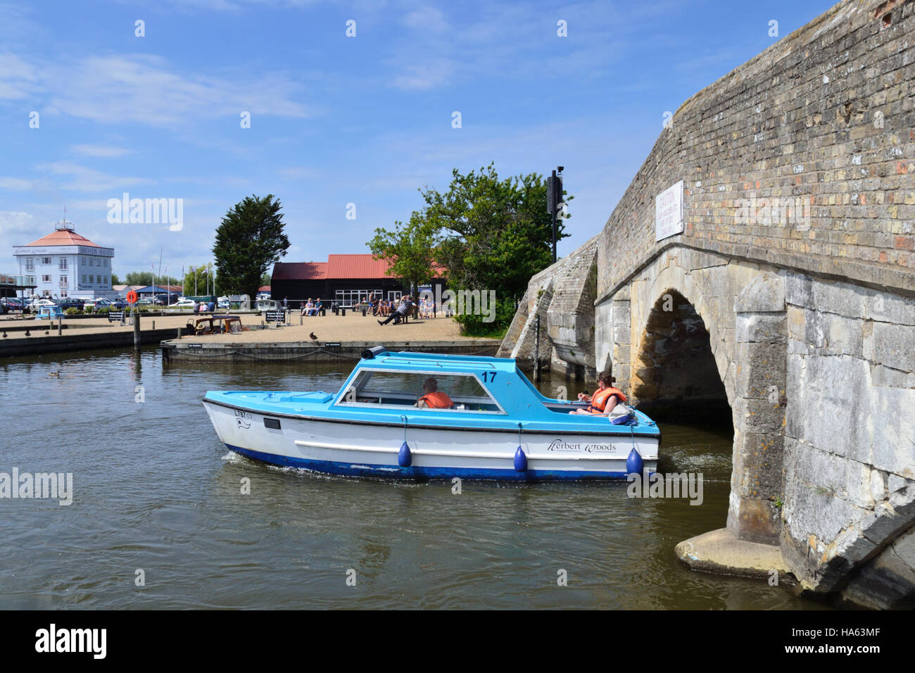 Day boat on the River Thurne navigating Potter Heigham Bridge on the