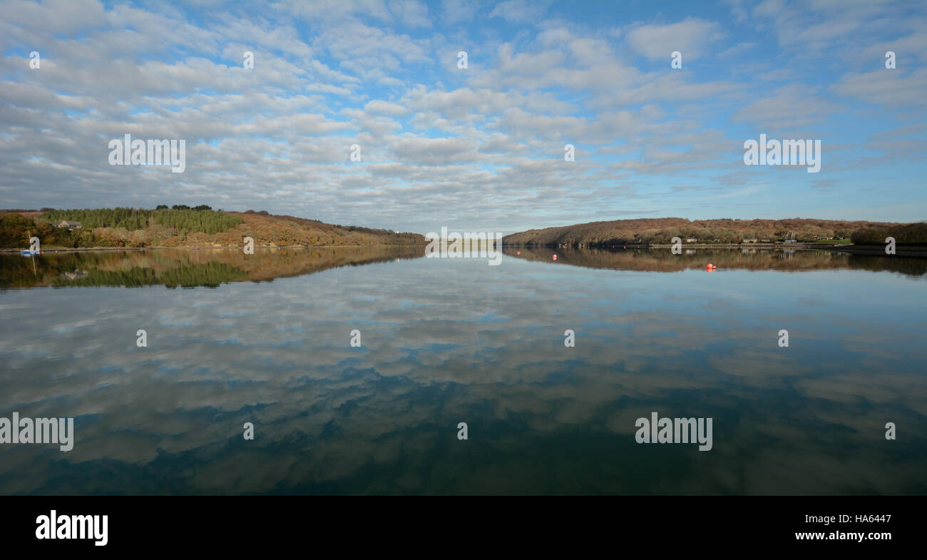 Perfect reflection of winter sky with light clouds and the banks of the Upper Cleddau in the water Stock Photo