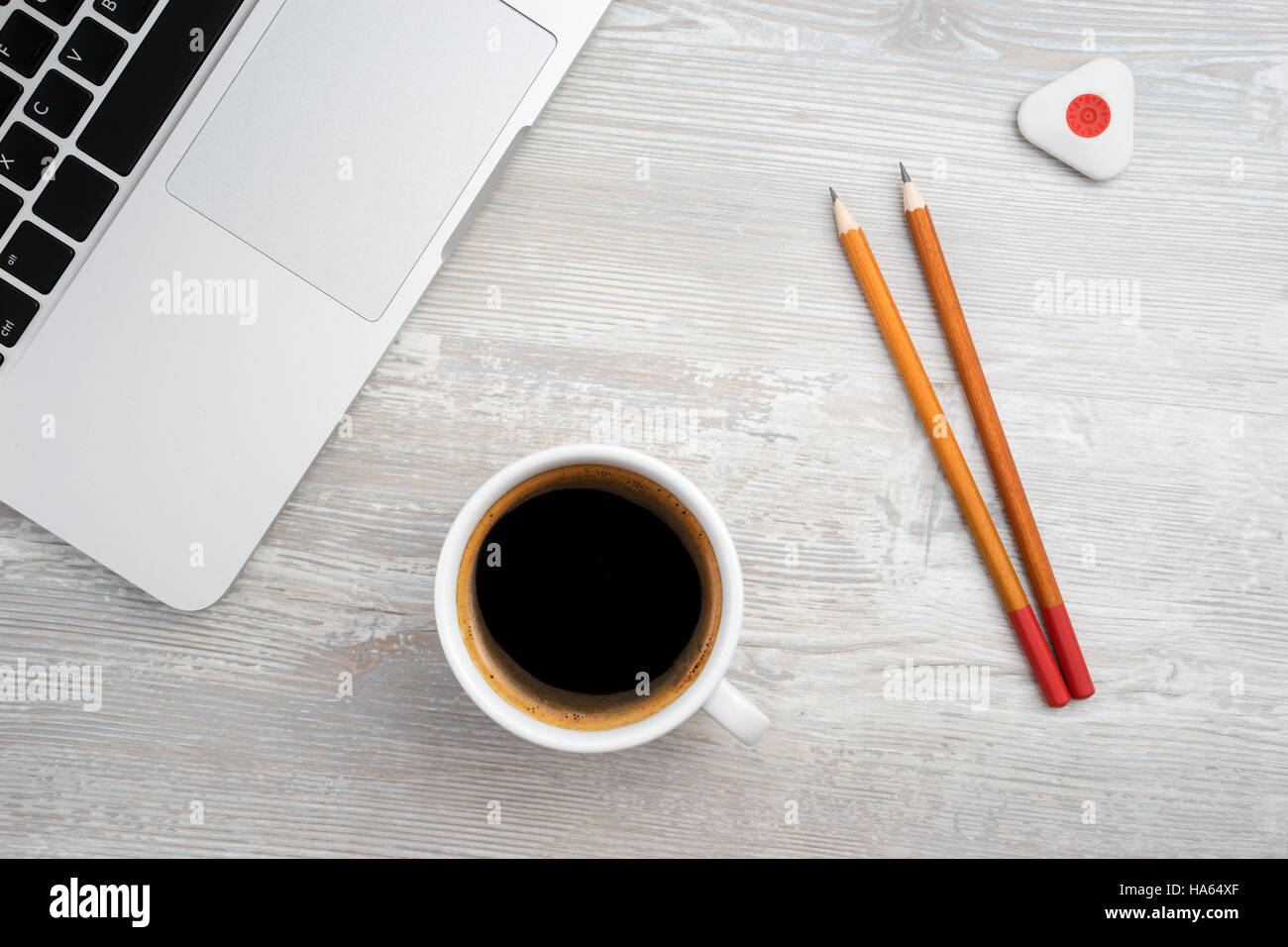 Two pencil, eraser and coffee on the table Stock Photo Alamy