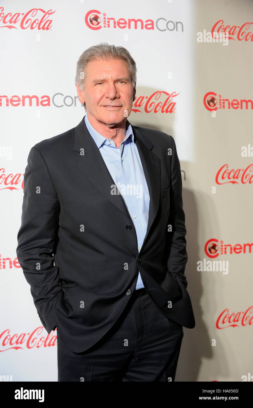 Actor Harrison Ford, recipient of the Lifetime Achievement Award, arrives at the CinemaCon awards ceremony at the Pure Nightclub at Caesars Palace during CinemaCon, the official convention of the National Association of Theatre Owners, on April 18, 2013 i Stock Photo