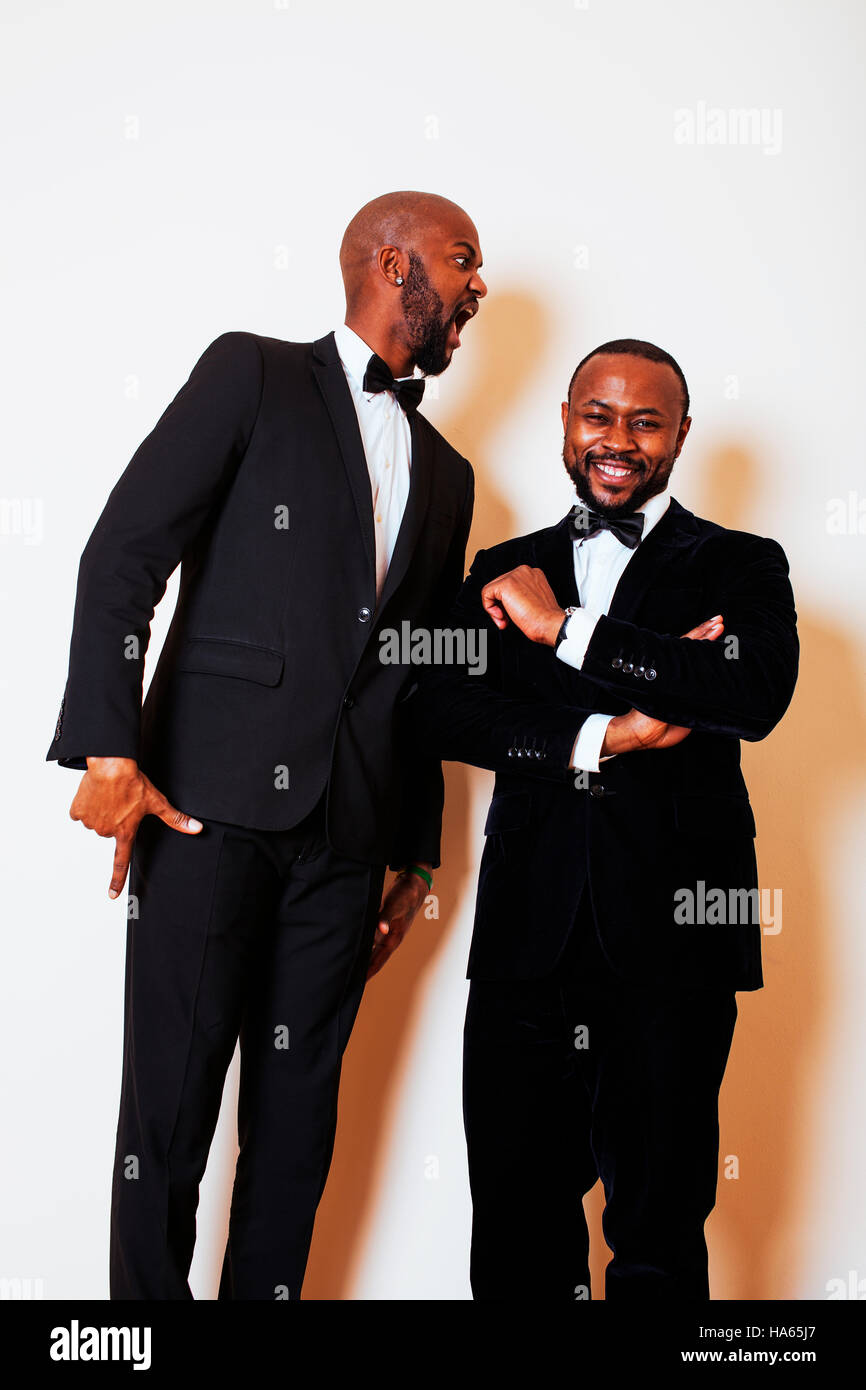 two afro-american businessmen in black suits emotional posing, g Stock ...