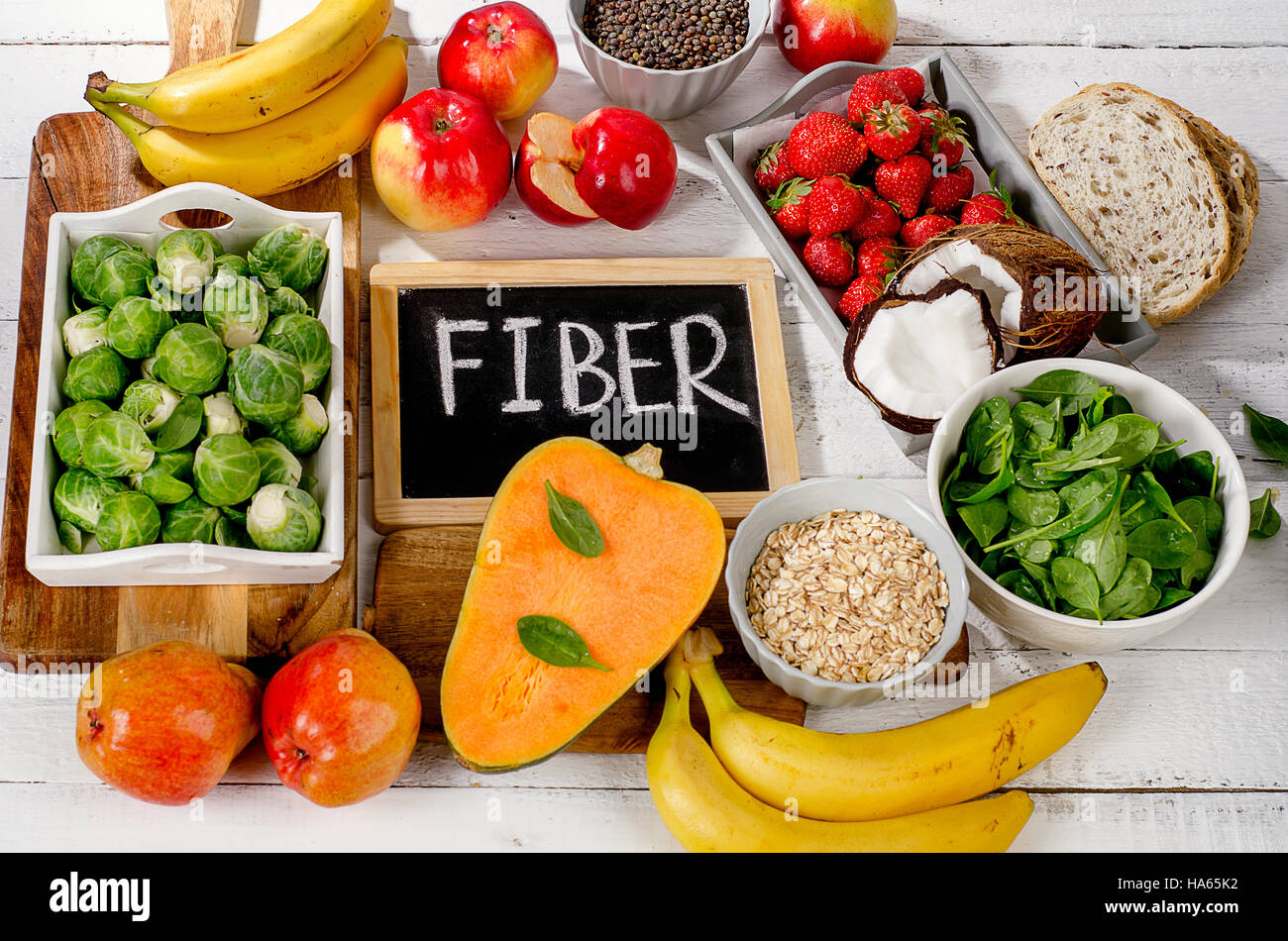 High Fiber Foods on  white wooden background. Flat lay Stock Photo