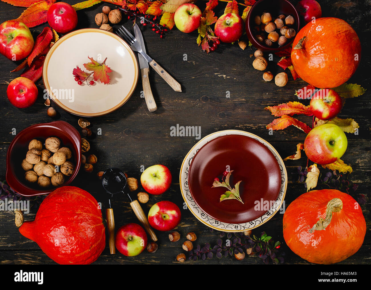 Autumn table setting with pumpkins and apples. Flat lay Stock Photo
