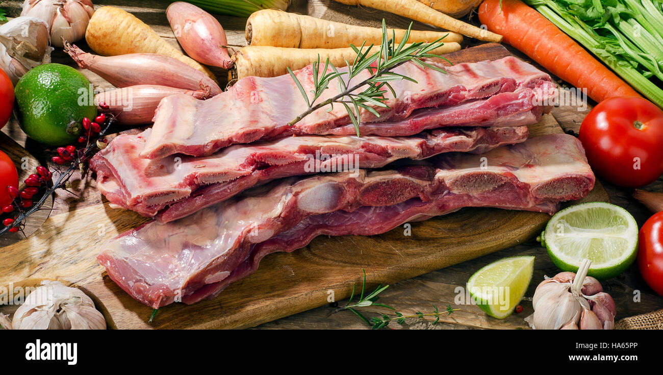 Raw fresh beef ribs and vegetables Stock Photo