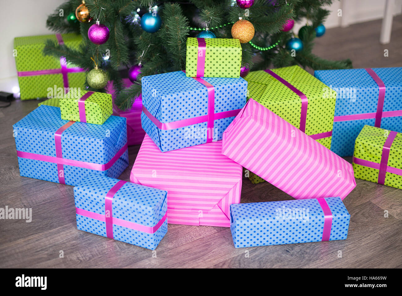 Boxes with Christmas gifts under the tree Stock Photo