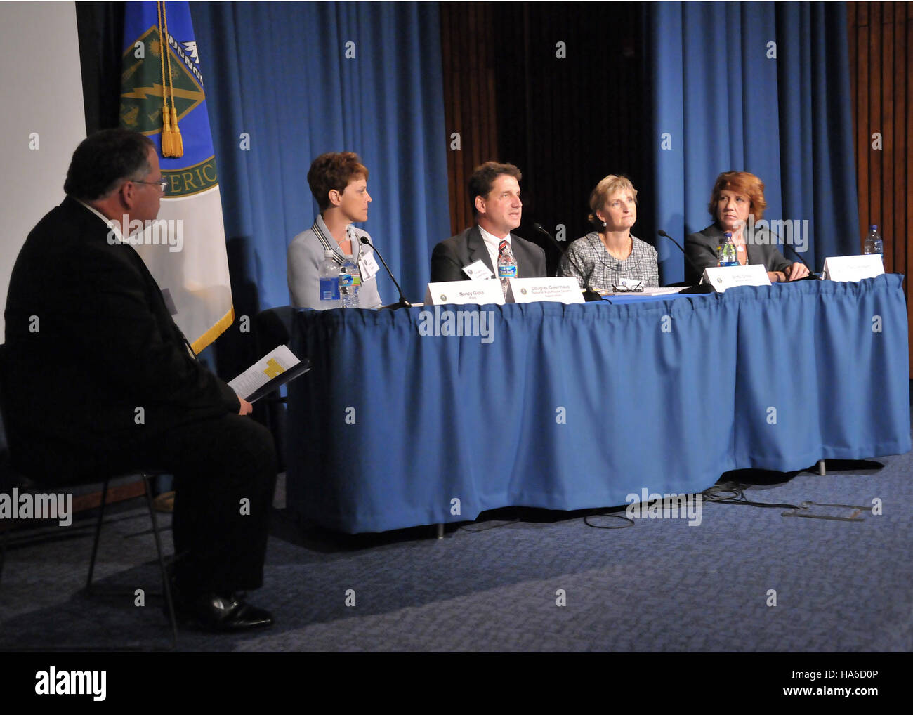 The Department of Energy hosted an industry panel at the EV Cities Workshop to discuss the future of electric vehicle (EV) infrastructure in urban environments. The session covered key topics such as sustainability, renewable energy integration, and the impact of EVs on reducing urban carbon emissions. Stock Photo