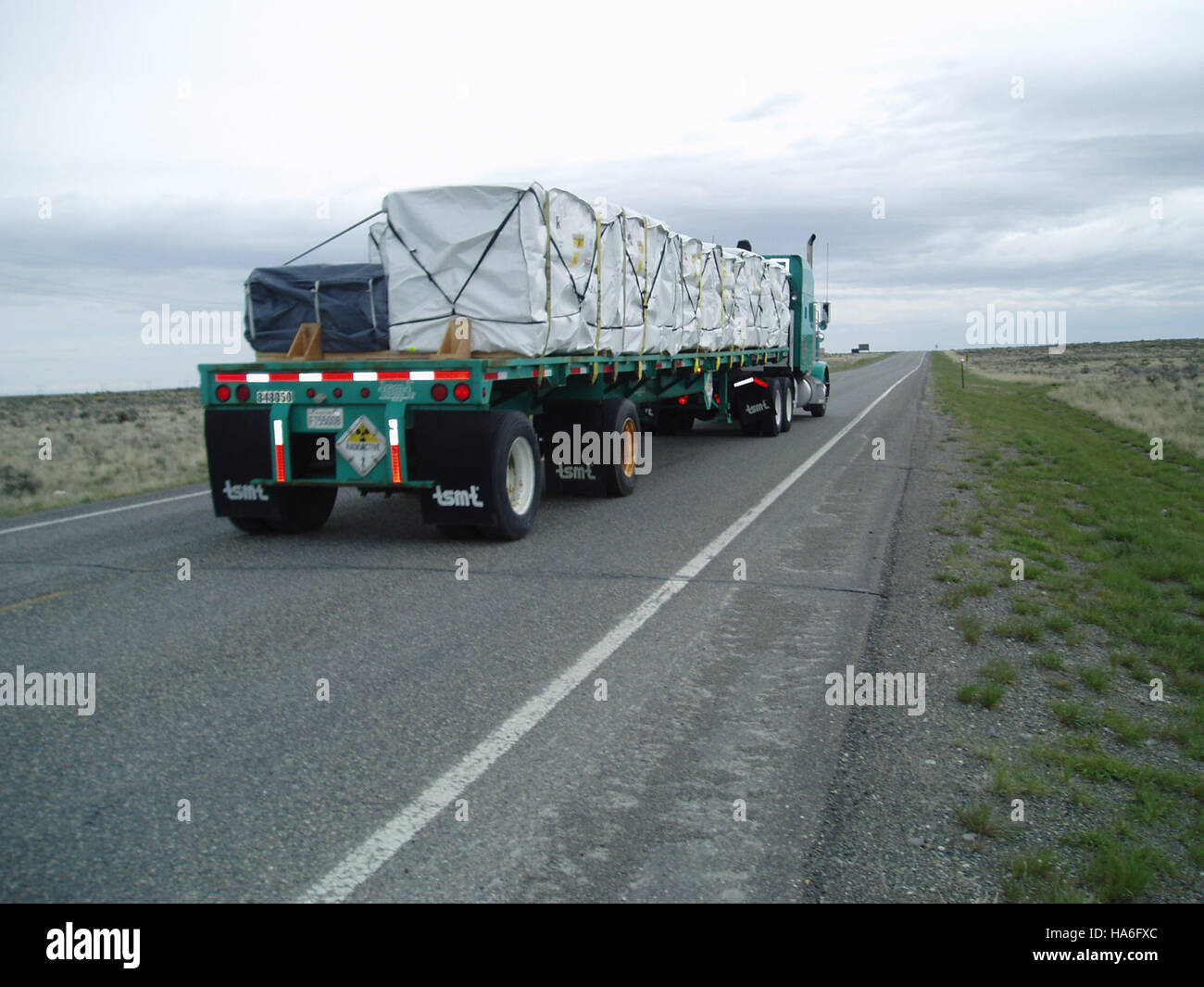 This image depicts workers completing the Advanced Mixed Waste ...