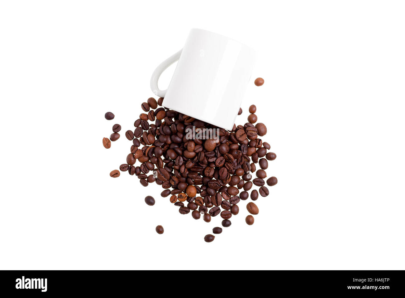 Overturned white mug with coffee beans, top view Stock Photo