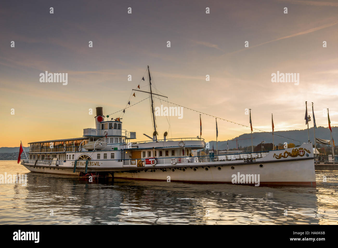 RAPPERSWIL, SWITZERLAND - AUGUST 17, 2014: Historical steam boat 'Stadt Rapperswil' preparing for cruise. Stock Photo