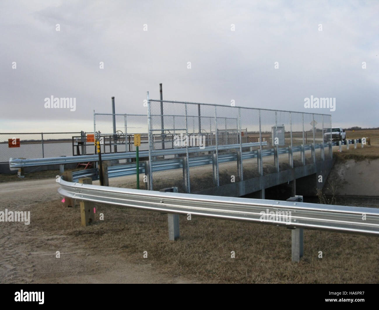 This image features the final inspection of a bridge railing project ...