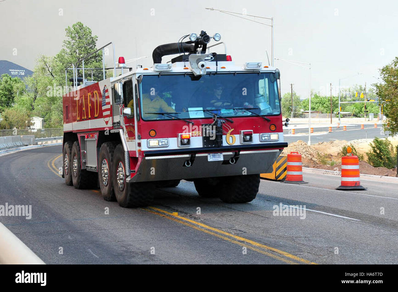 Heavy Fire Rig This image captures heavy equipment being deployed to combat a large ...