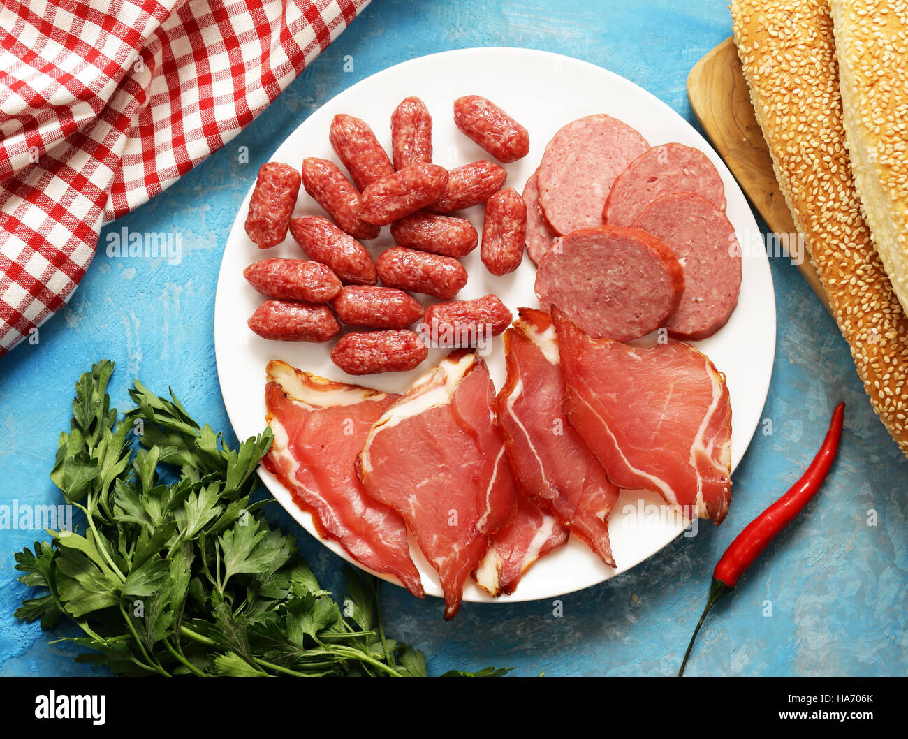 Assorted deli meats sausage, salami, parma, prosciutto Stock Photo