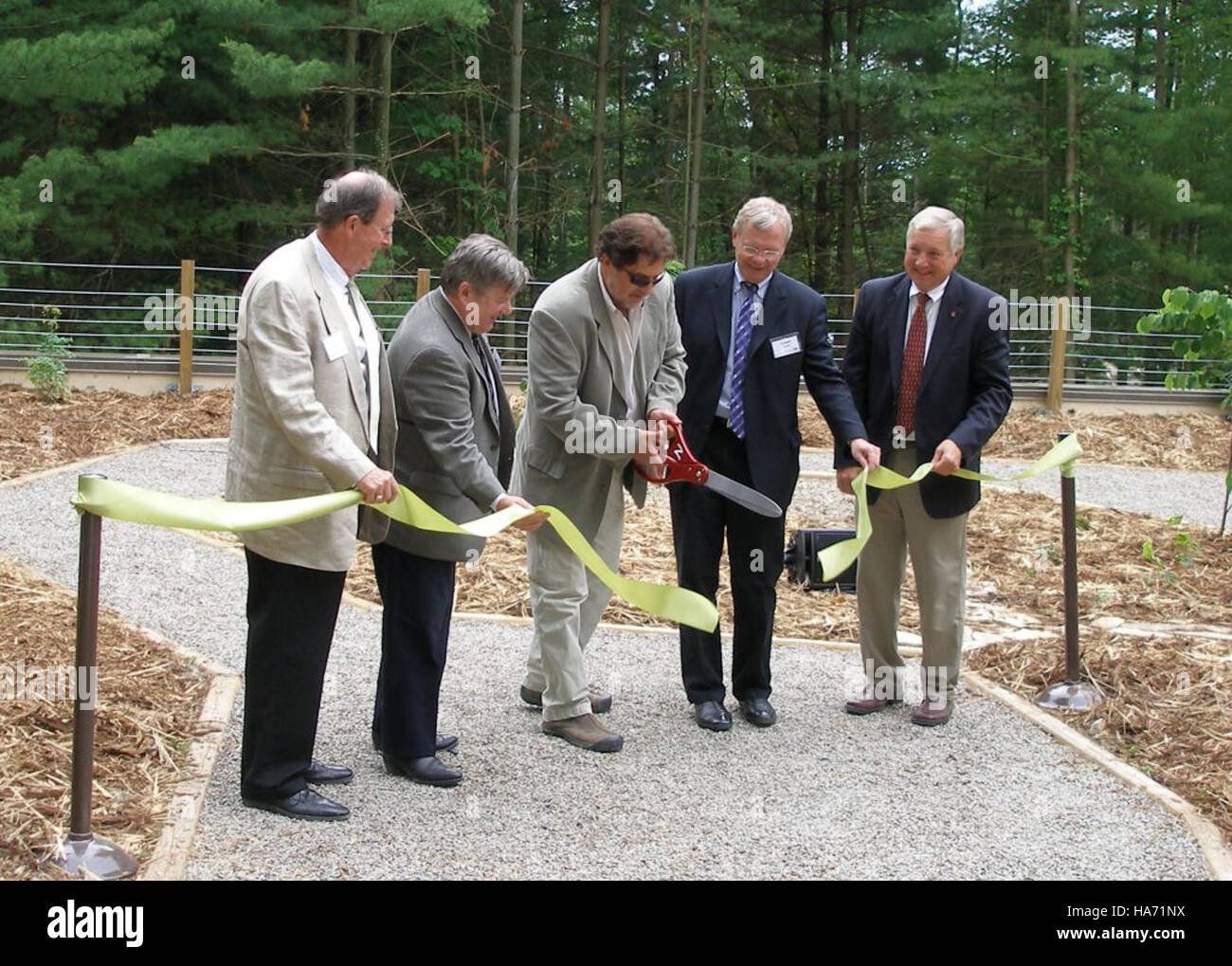 Infrastructure Ribbon A ribbon-cutting ceremony marks the opening of a new facility or trail ...
