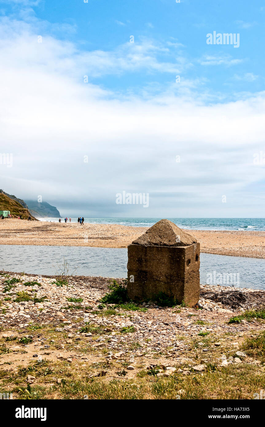 One anti-tank emplacement is left standing on the beach, a relic of coastal defence, it was once part of a long chain known as Dragons Teeth Stock Photo