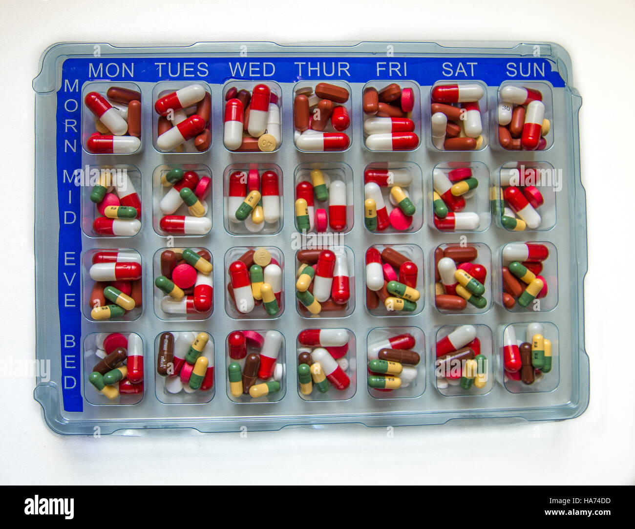 Tablets and capsules in a monitored dosage system (MDS Stock Photo Alamy