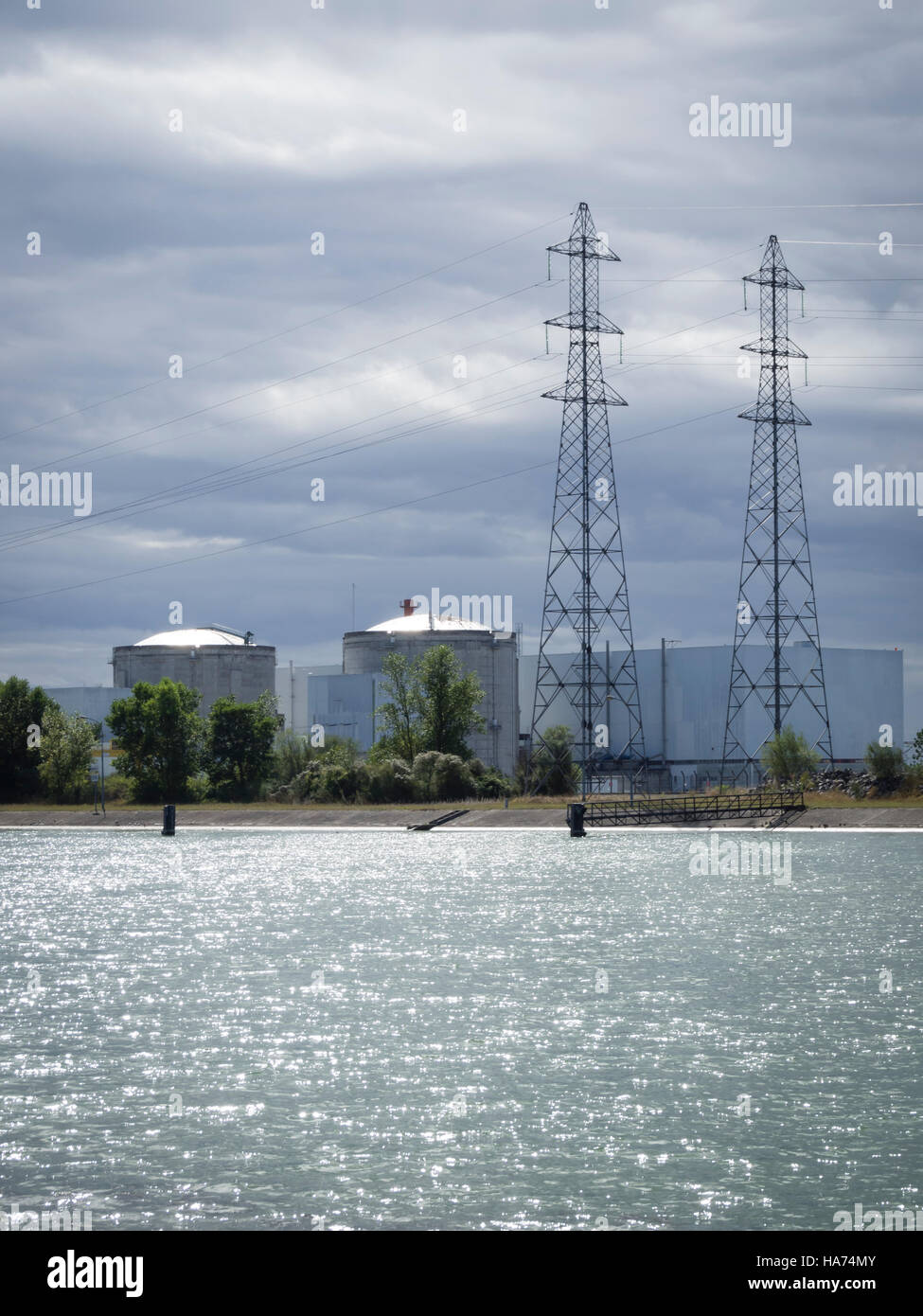 Reactor blocks of the nuclear power plant Fessenheim, France, at the river of Rhine. Stock Photo