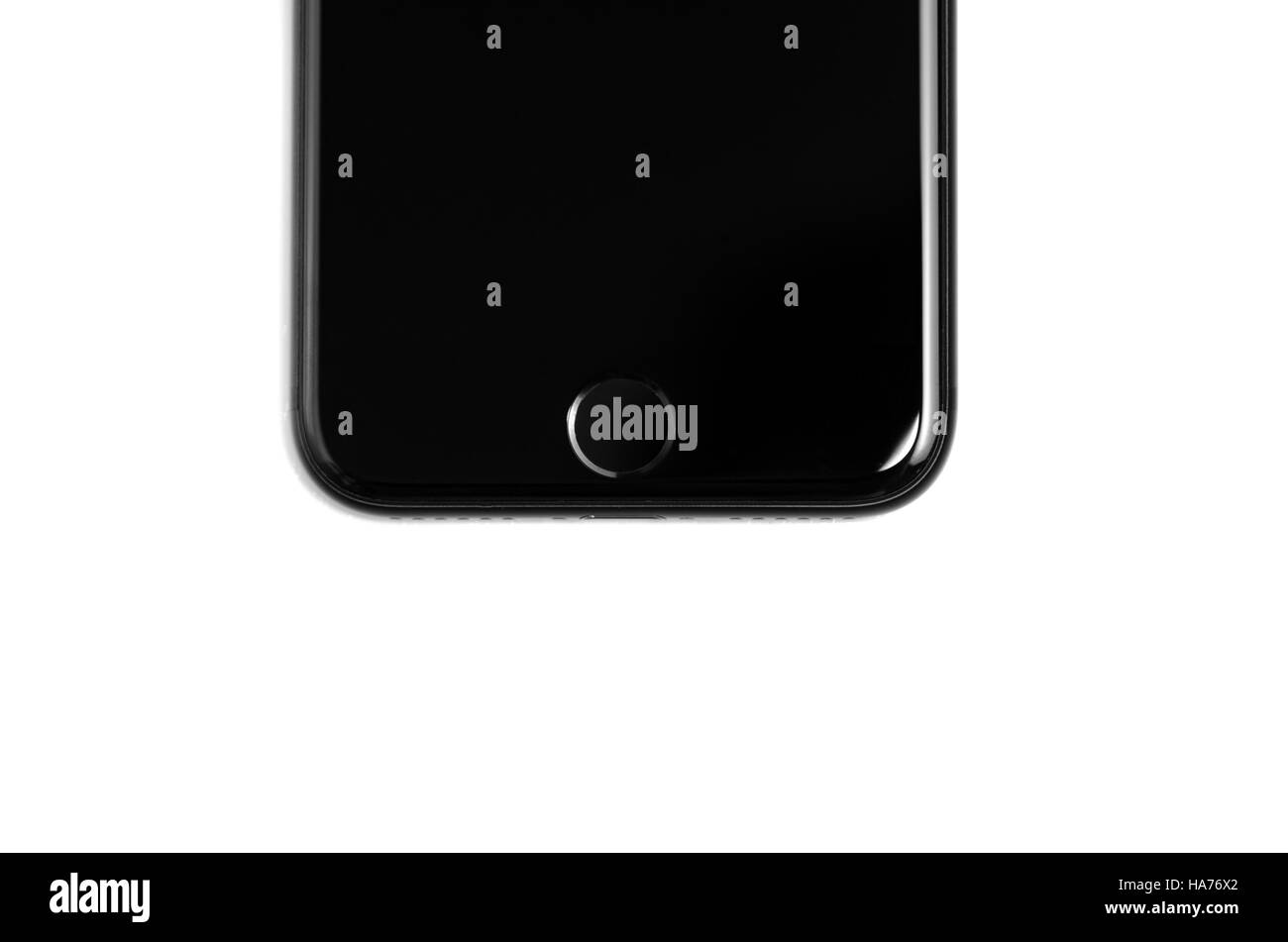 iPhone 7 black matte jetblack detail of new Apple product fingerprint sensor Home button isolated on white Stock Photo