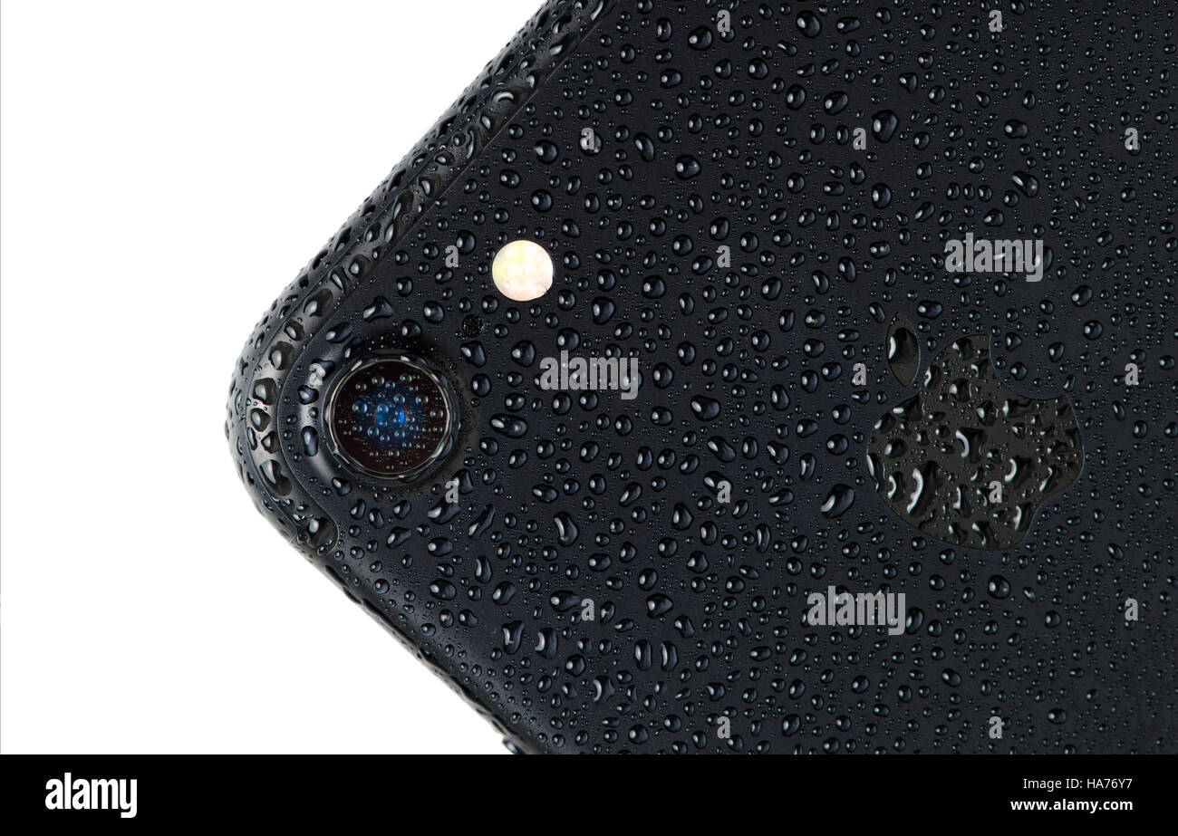 BRASOV, ROMANIA - 26 November 2016: iPhone 7 black matte with waterdrops on back and camera, isolated Stock Photo