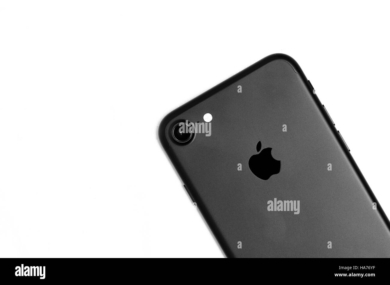 iPhone 7 black matte detail of back with camera and quad-flash isolated on white background Stock Photo