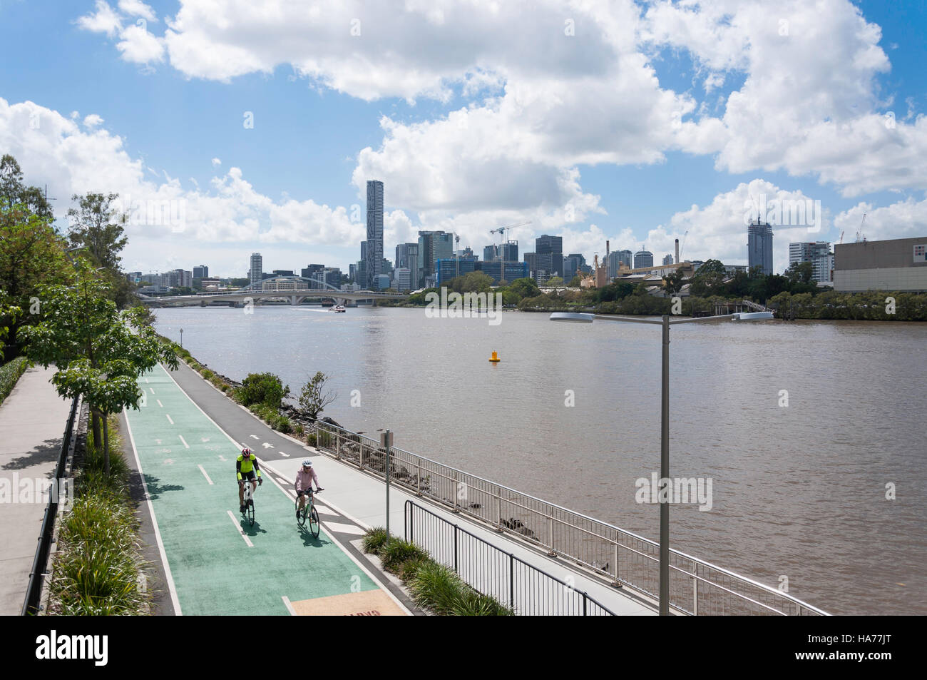City skyline and Bicentennial Bikeway on banks of Brisbane River, Milton, Brisbane, Queensland, Australia Stock Photo