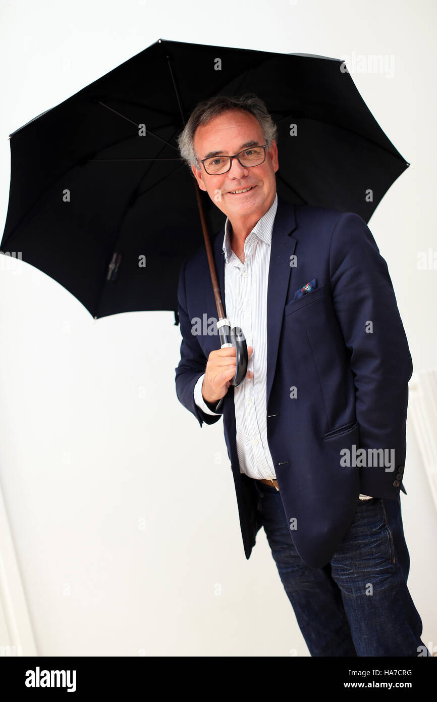 Cherbourg (North-western France): Jean-Pierre Yvon, CEO of the umbrella  brand and factory "Le Véritable Cherbourg Stock Photo - Alamy