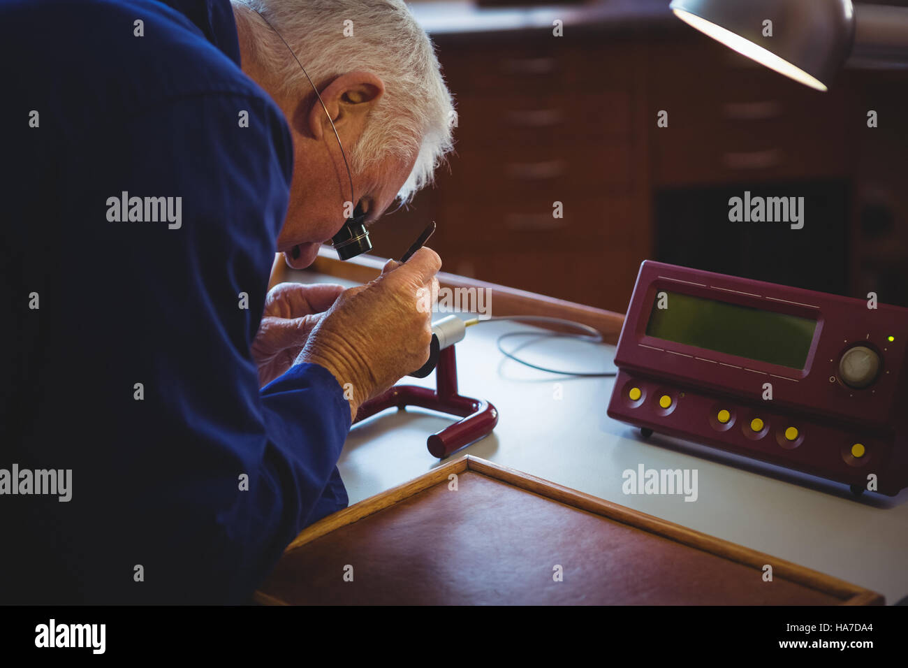 Horologist repairing a watch Stock Photo Alamy