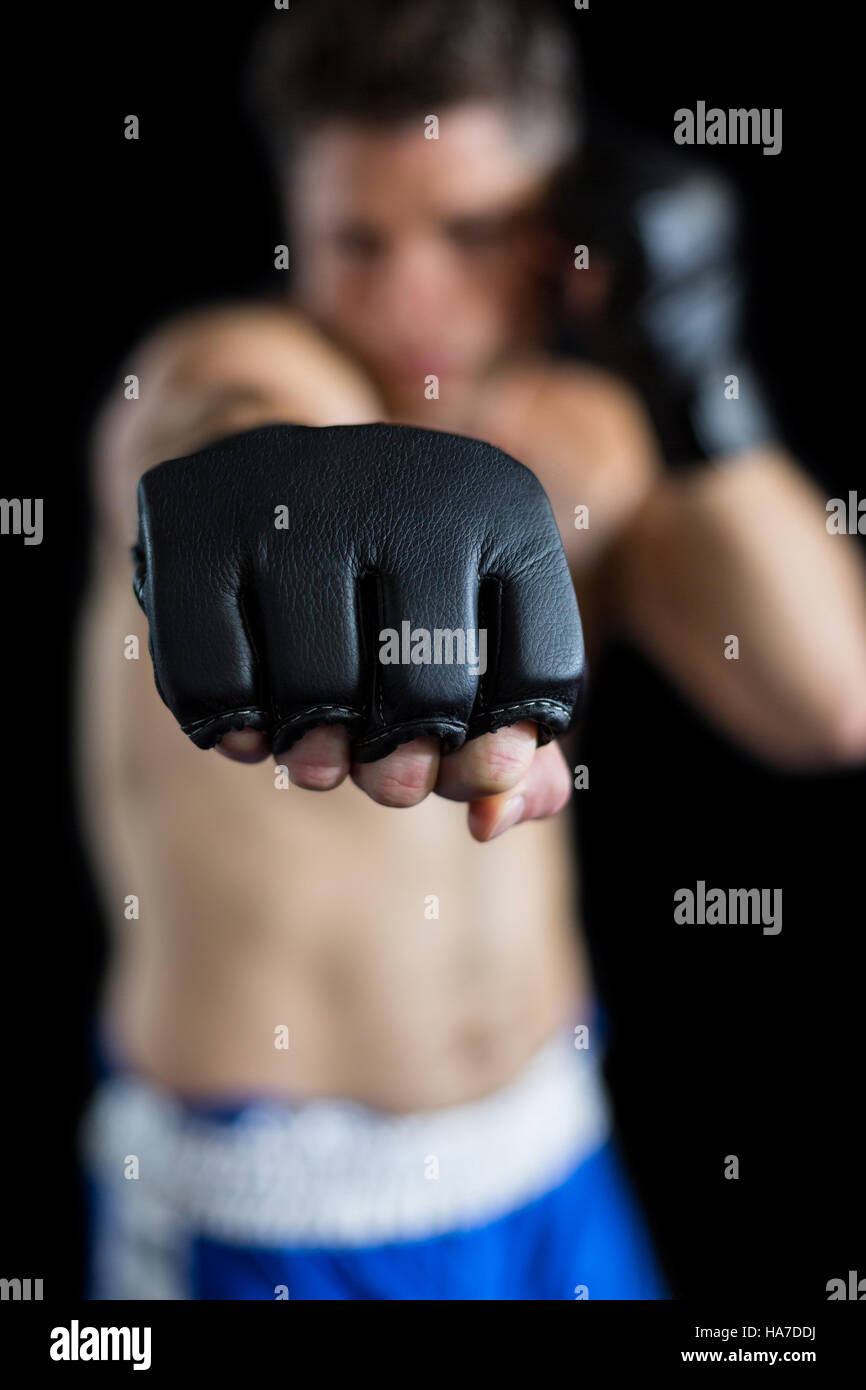 Boxer performing boxing stance Stock Photo Alamy