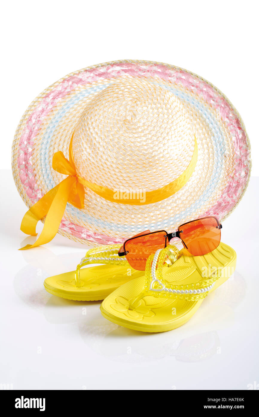 Beach accessoires, sun hat, flip-flops, sunglasses Stock Photo