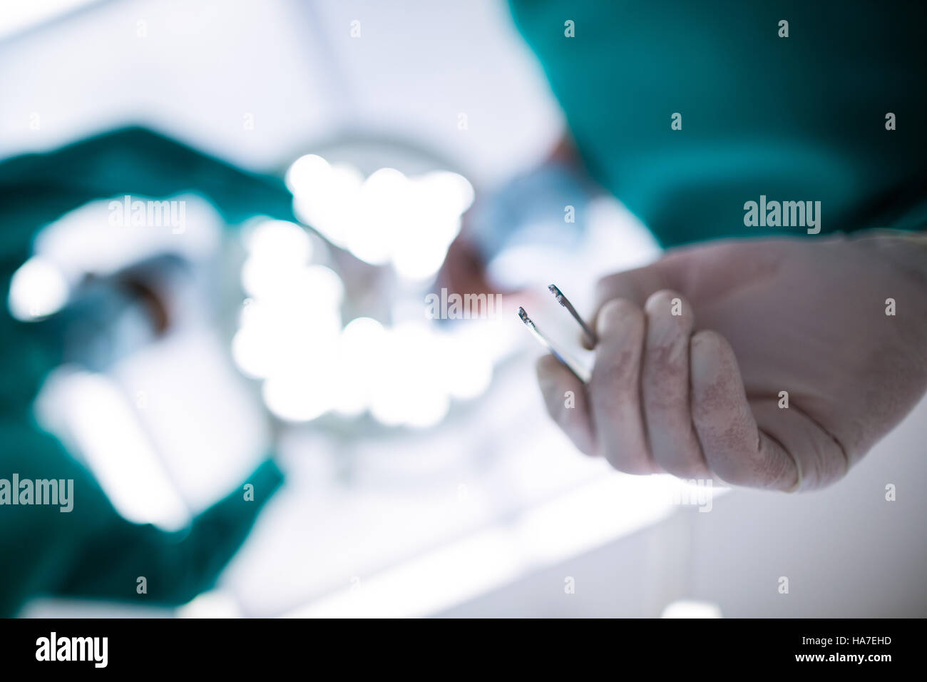 Surgeons operating in operation theater Stock Photo