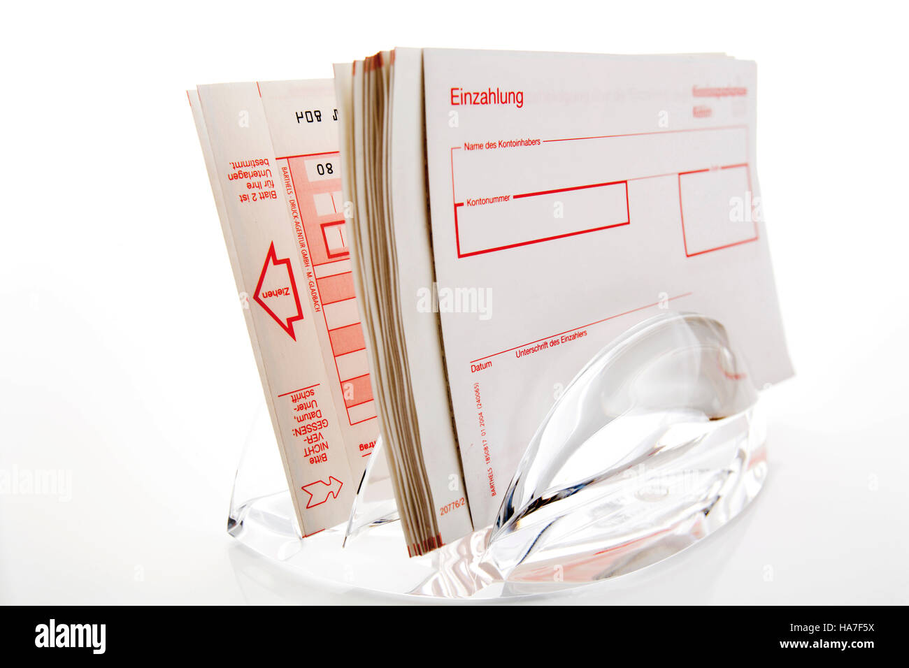 Money transfer forms in a plastic stand Stock Photo Alamy