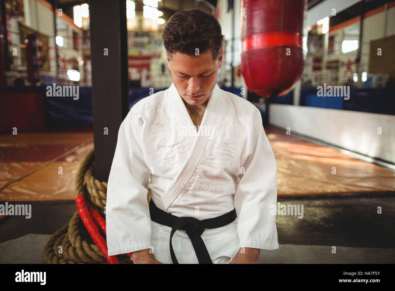 Karate player sitting in seiza position Stock Photo