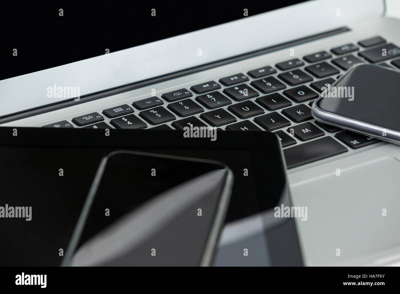 Laptop, digital tablet and mobile phones on white background Stock Photo