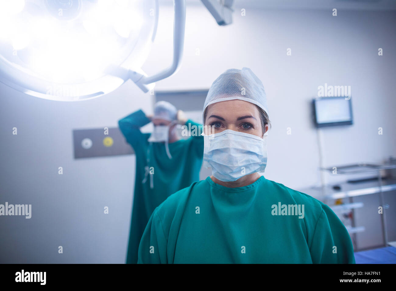 Portrait of surgeon in operation room Stock Photo - Alamy