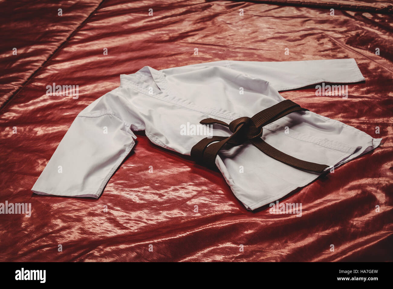 Karate uniform and brown belt Stock Photo