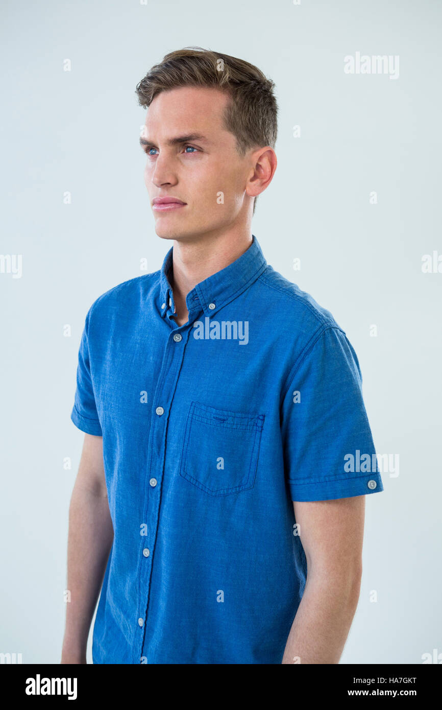 Man in a blue shirt hi-res stock photography and images - Alamy