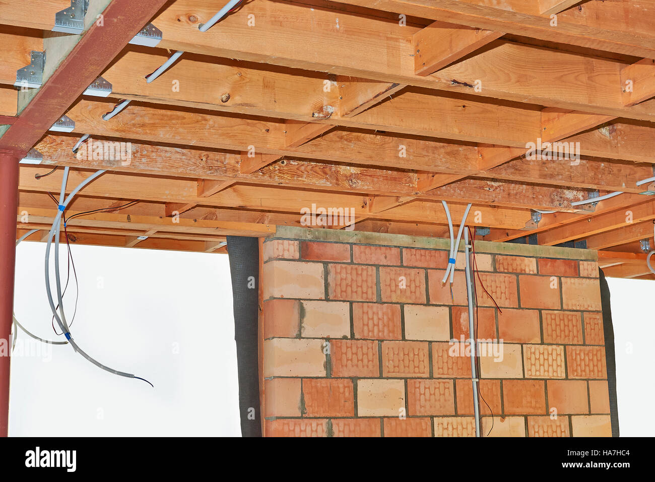 New brick wall and ceiling roof in construction Ready for completion Stock  Photo - Alamy, image size:1300x956