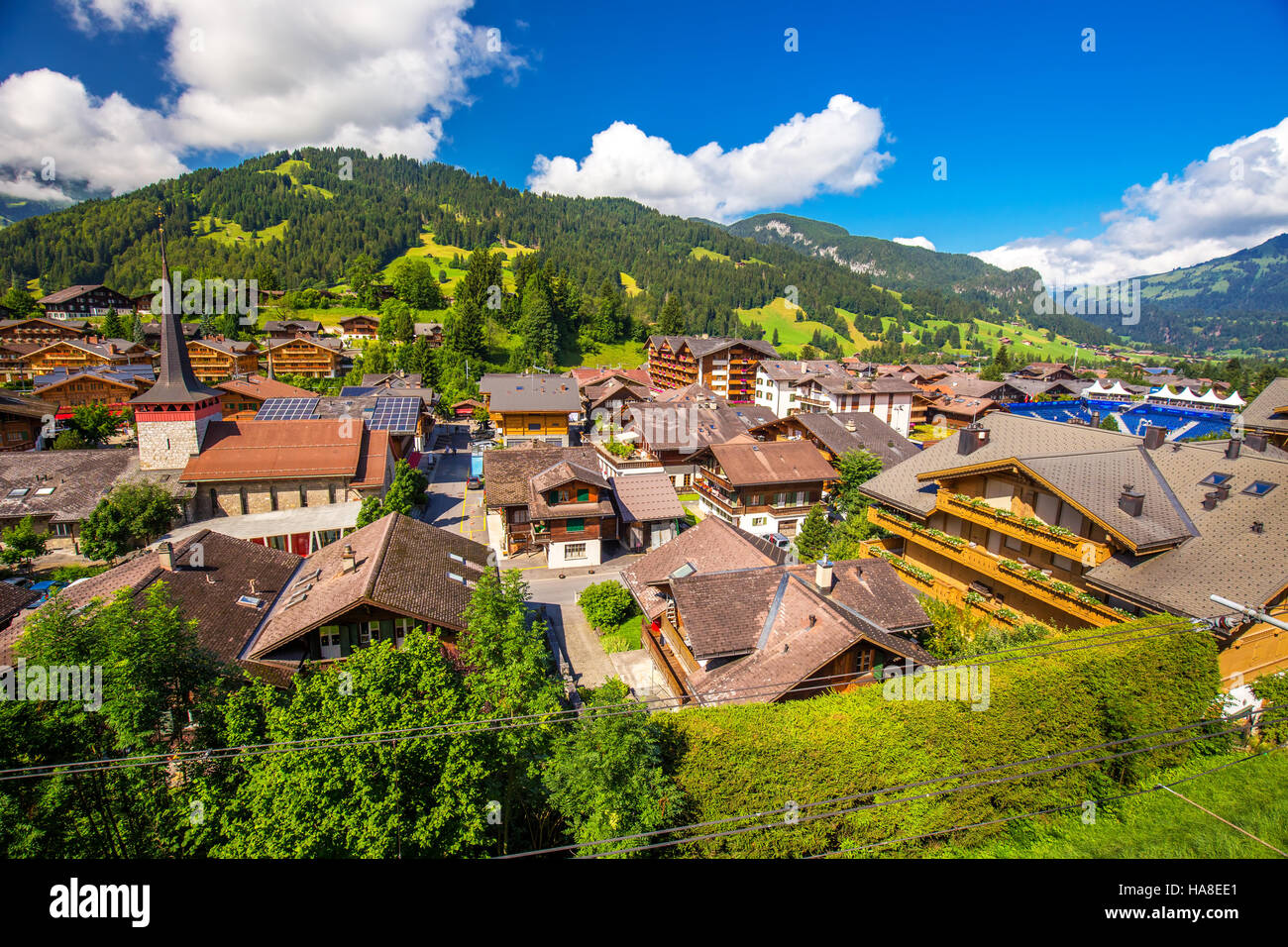 Old city center of Gstaad town in Swiss Alps, famous ski resort in canton Bern, Switzerland. Stock Photo