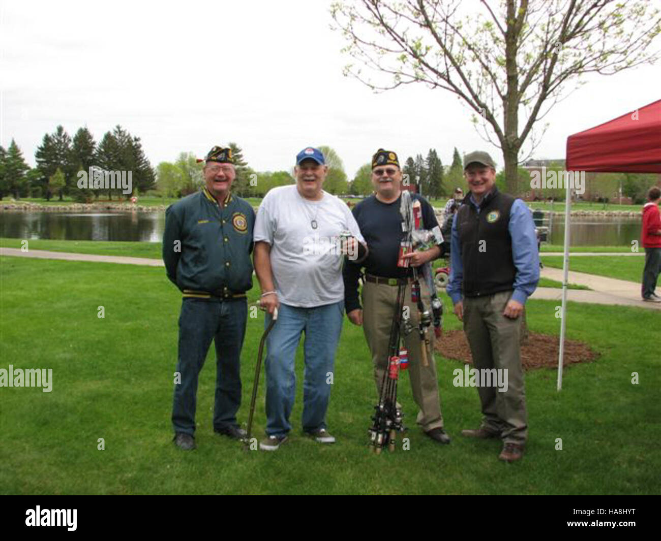 usfwsmidwest 5750903294 American Legion and USFWS congratulate the angler who caught the largest largemouth bass. (FWS) Stock Photo