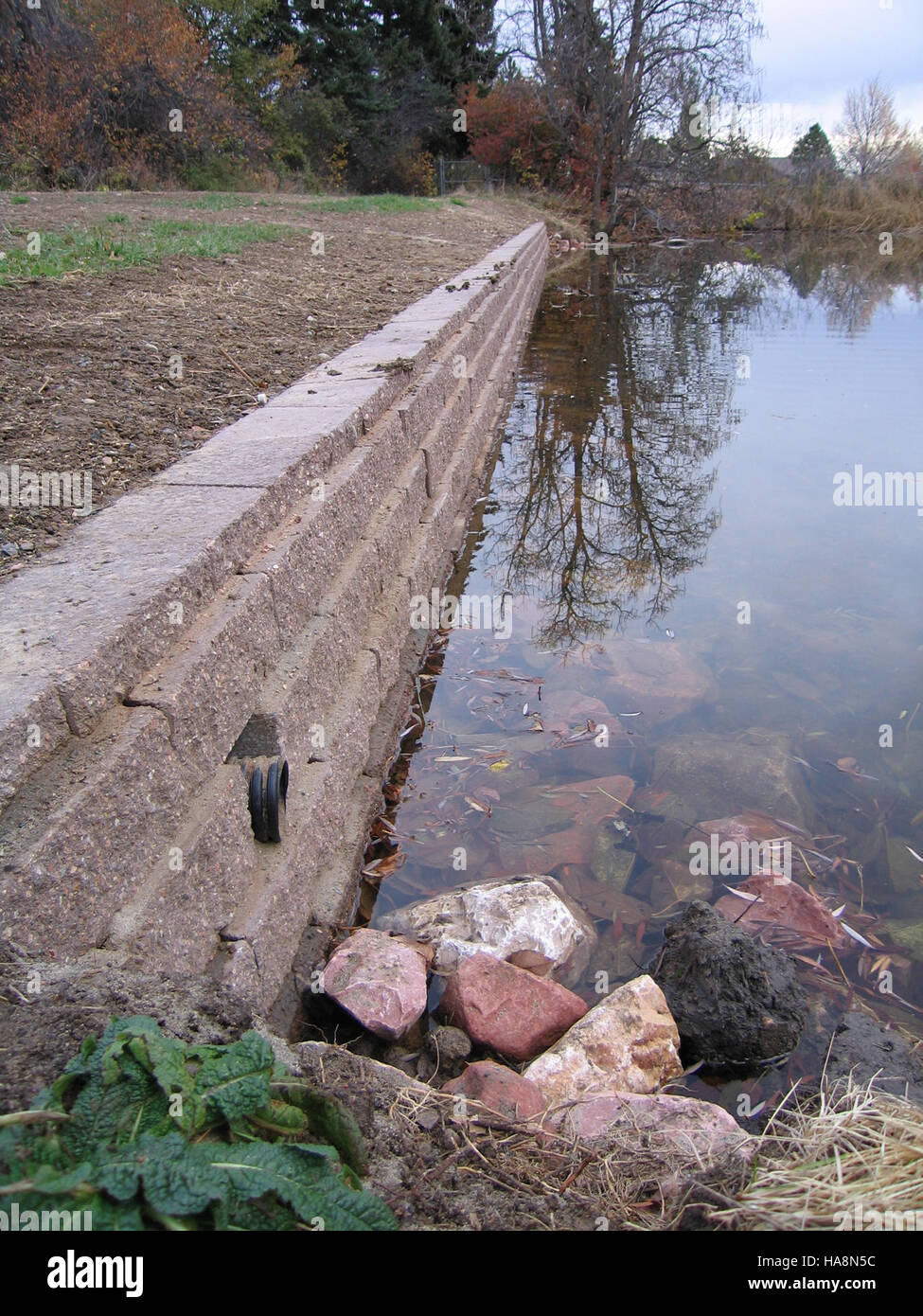 A retaining wall in a national park serves to stabilize soil and ...