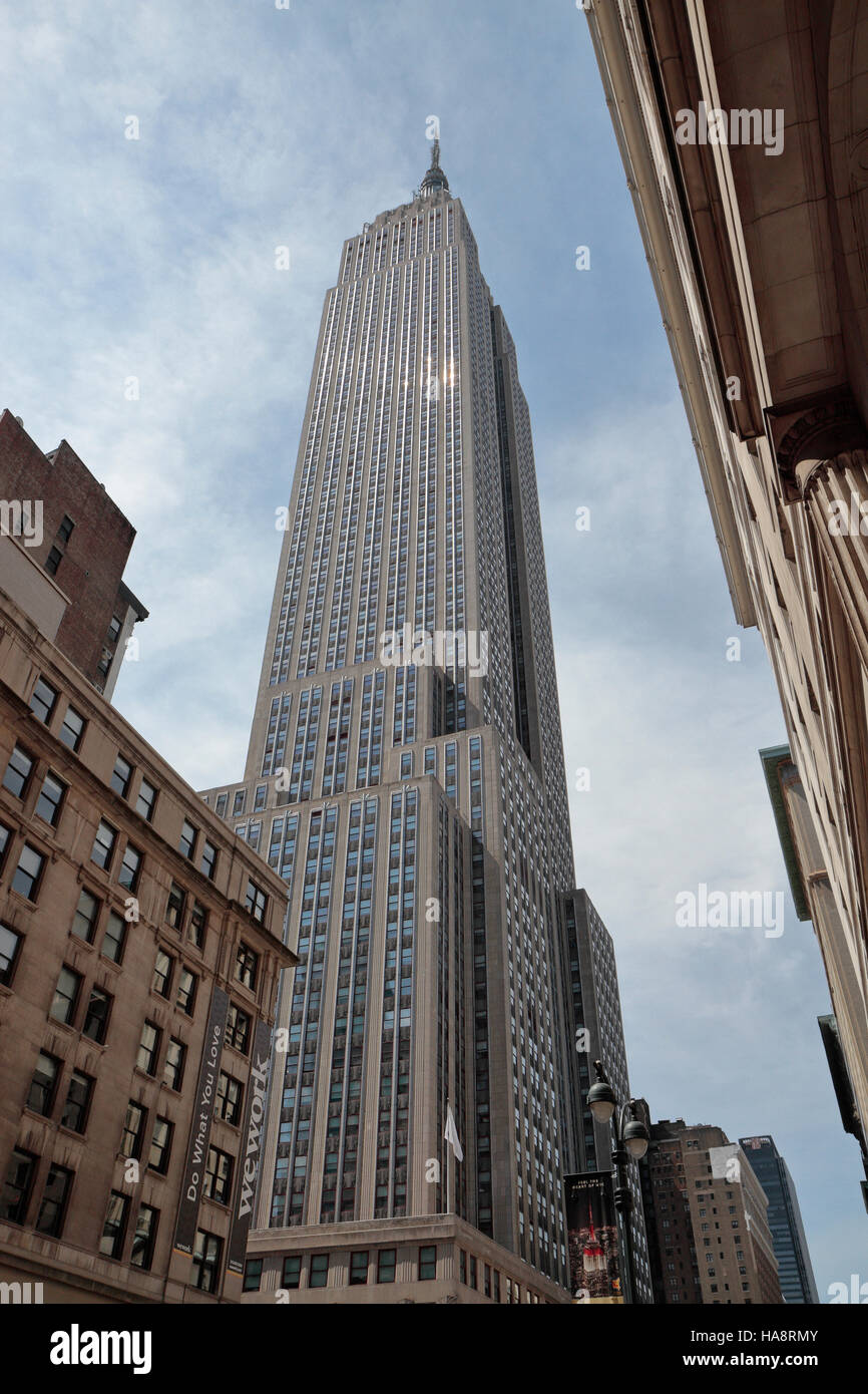 Looking up at the Empire State Building on 34th Street, Manhattan, New