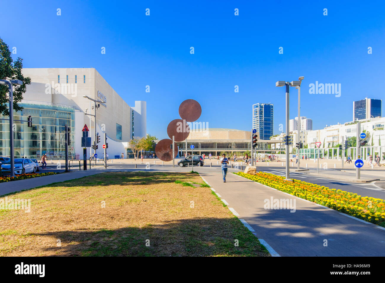 TEL AVIV, ISRAEL - MAY 15, 2015: Scene of the Rothschild Boulevard, a mobile library and the Habima Square (The Orchestra Plaza), with visitors, in Te Stock Photo