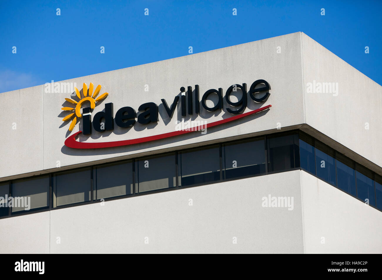 A logo sign outside of the headquarters of the Ideavillage Products