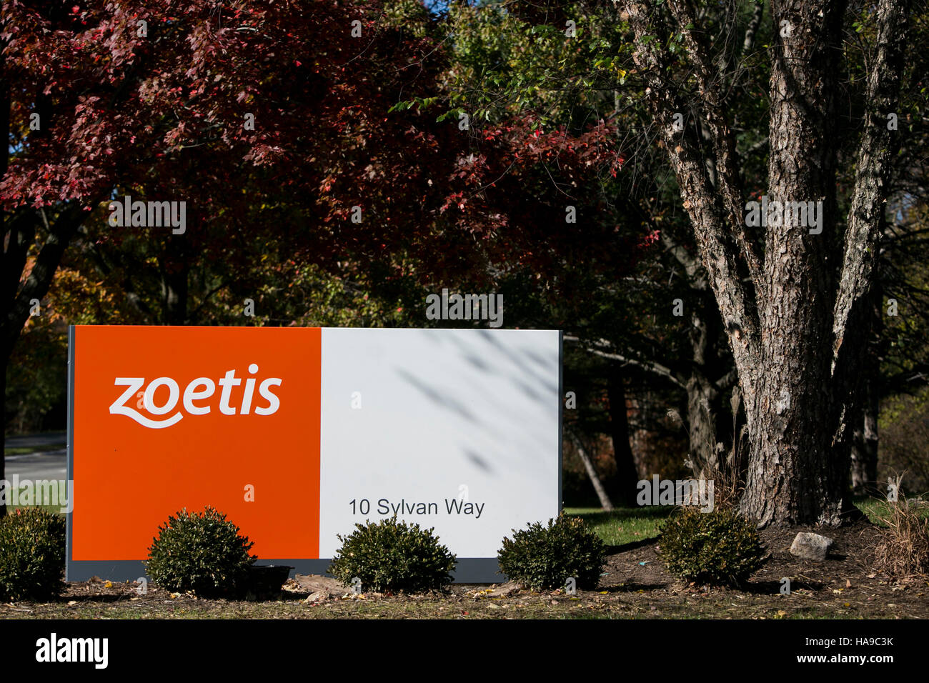 A logo sign outside of a facility occupied by Zoetis, Inc., in