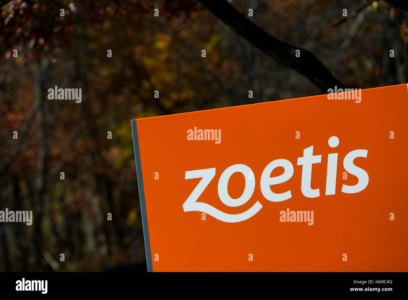 A logo sign outside of a facility occupied by Zoetis, Inc., in