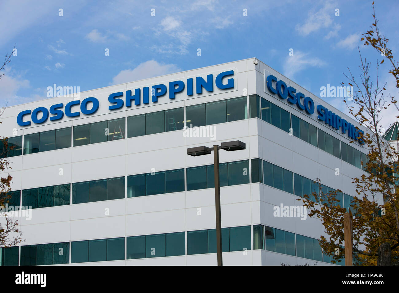 A logo sign outside of a facility occupied by the China Ocean Shipping Company (COSCO) in Secaucus, New Jersey on November 5, 2016. Stock Photo