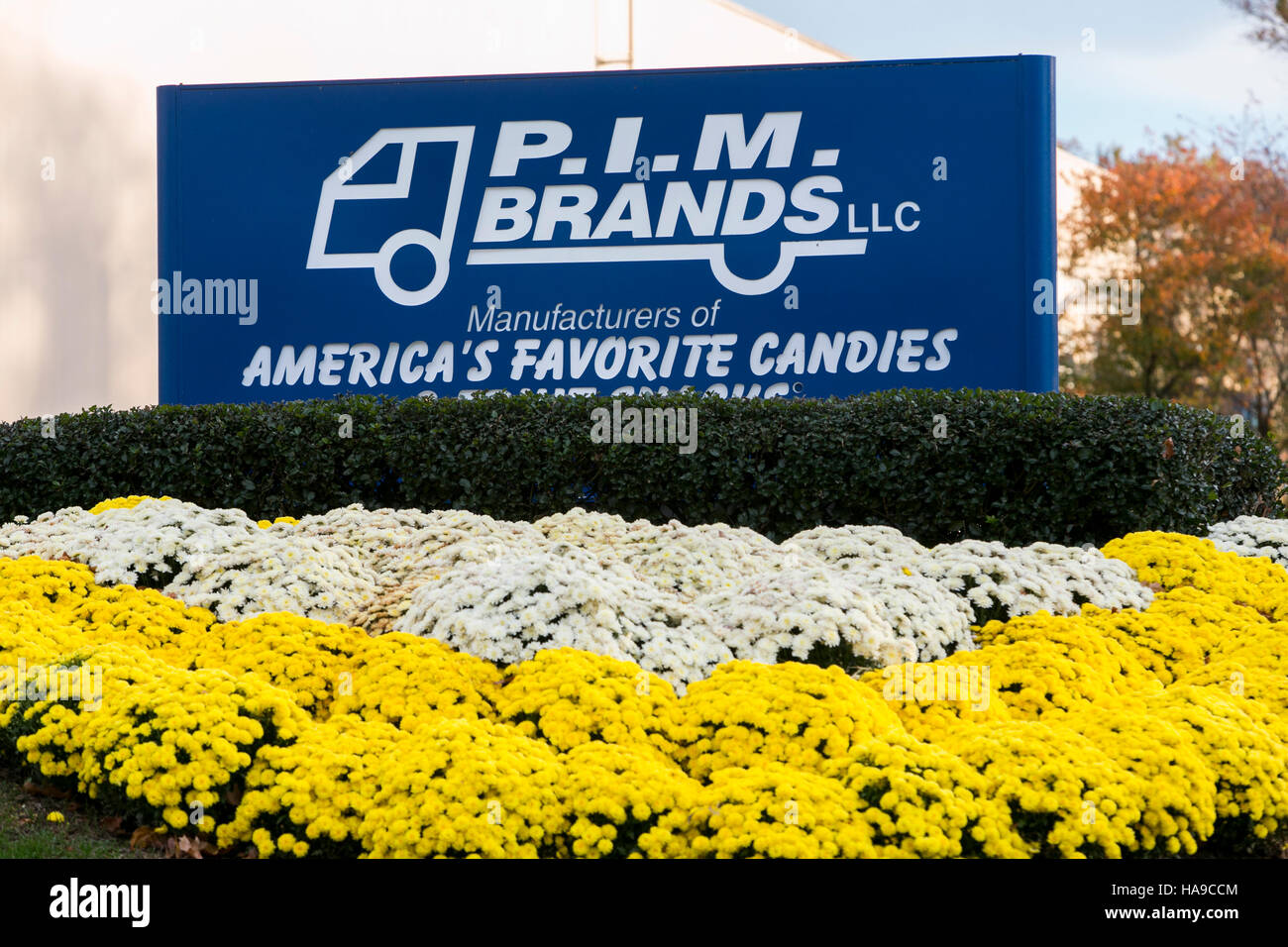 A logo sign outside of a facility occupied by P.I.M. Brands LLC, in